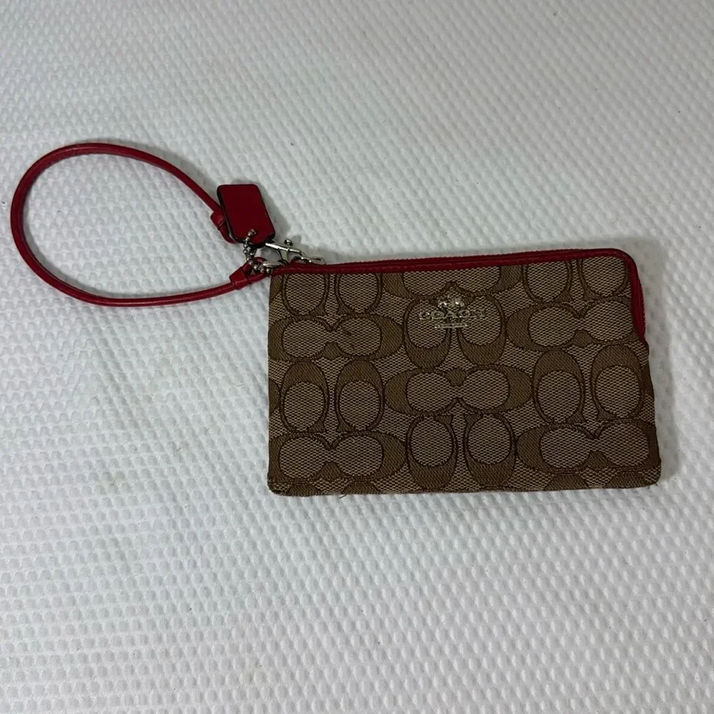 Coach tan and red Wristlet with Logo Pattern